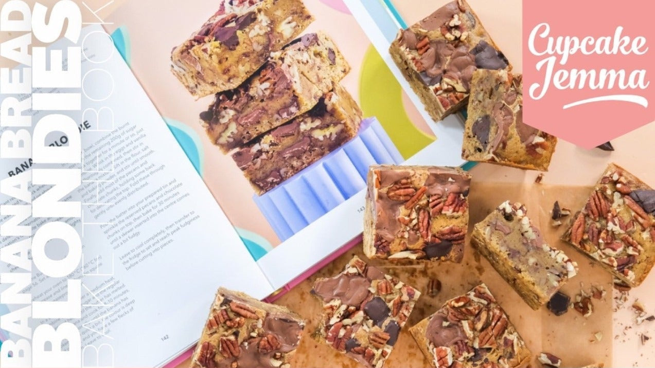 Banana Bread Blondie downloadable recipe by Cupcake Jemma featuring blondies with pecans and chocolate chunks.