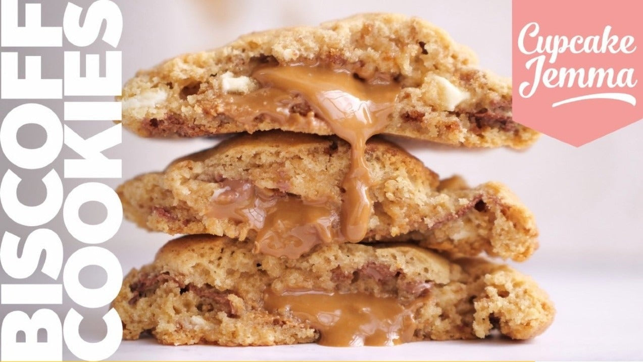Close-up of gooey Biscoff New York Cookies with melted spread and baking recipe by Cupcake Jemma visible