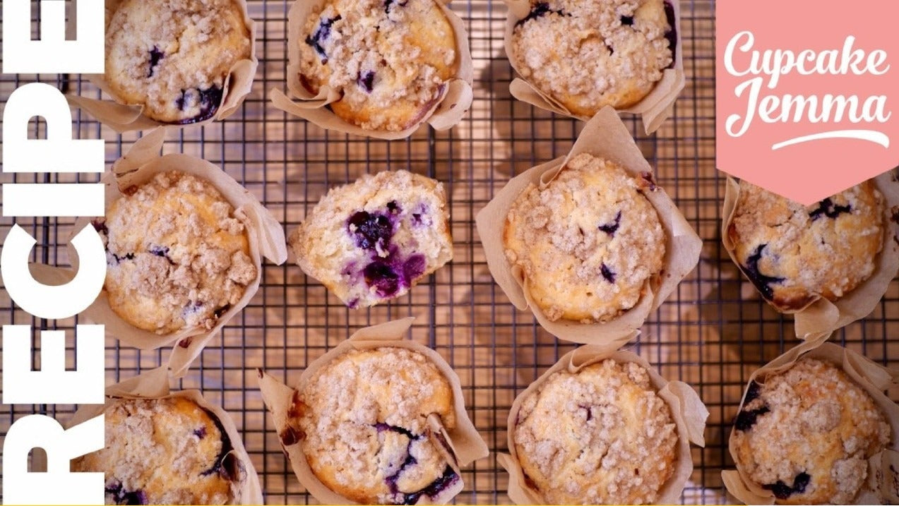 Blueberry Muffins downloadable recipe by Cupcake Jemma with ingredients list and freshly baked muffins on a cooling rack