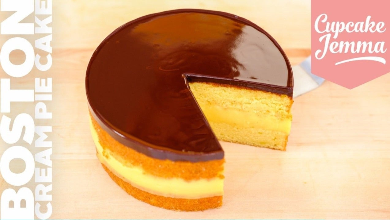 Boston Cream Pie Cake with rich custard and chocolate ganache shown for Cupcake Jemma baking recipe download