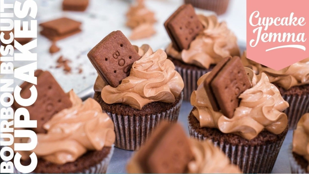 Close-up of Bourbon Biscuit Cupcakes with creamy frosting and biscuit topping for a downloadable recipe by Cupcake Jemma