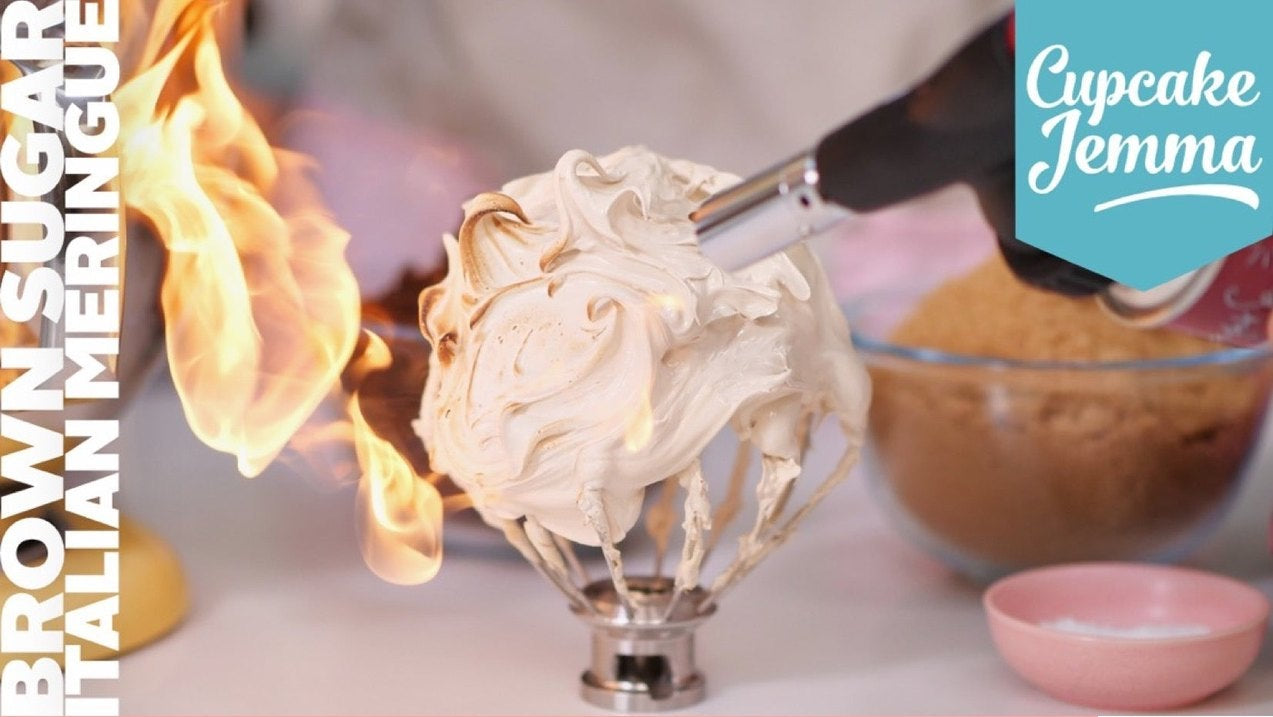 Brown Sugar Italian Meringue downloadable recipe by Cupcake Jemma showing flaming meringue on whisk with ingredients list