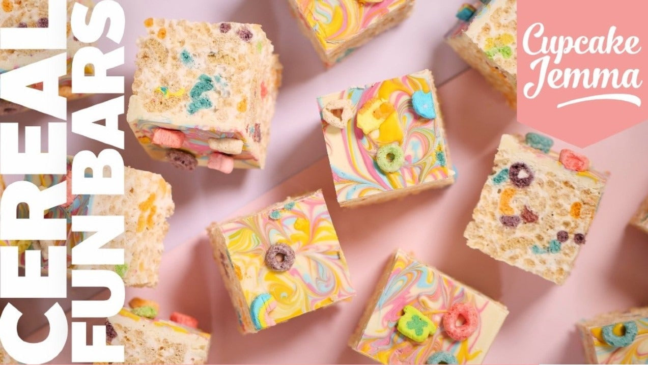 Colorful cereal fun bars made with marshmallows and chocolate, featured in the Cereal Fun Bar downloadable recipe by Cupcake Jemma