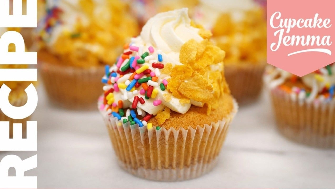 Close-up of a colorful cupcake with sprinkles and buttercream from the Cereal Milk Cupcakes downloadable recipe by Cupcake Jemma