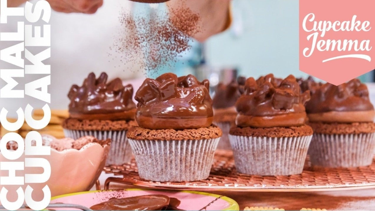 Chocolate Malt Cupcakes with rich chocolate frosting topped, styled in baking setting by Cupcake Jemma recipe download
