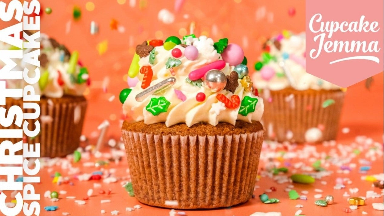 Christmas Spice Cupcakes downloadable recipe featuring festive cupcakes with colorful sprinkles and buttercream frosting.
