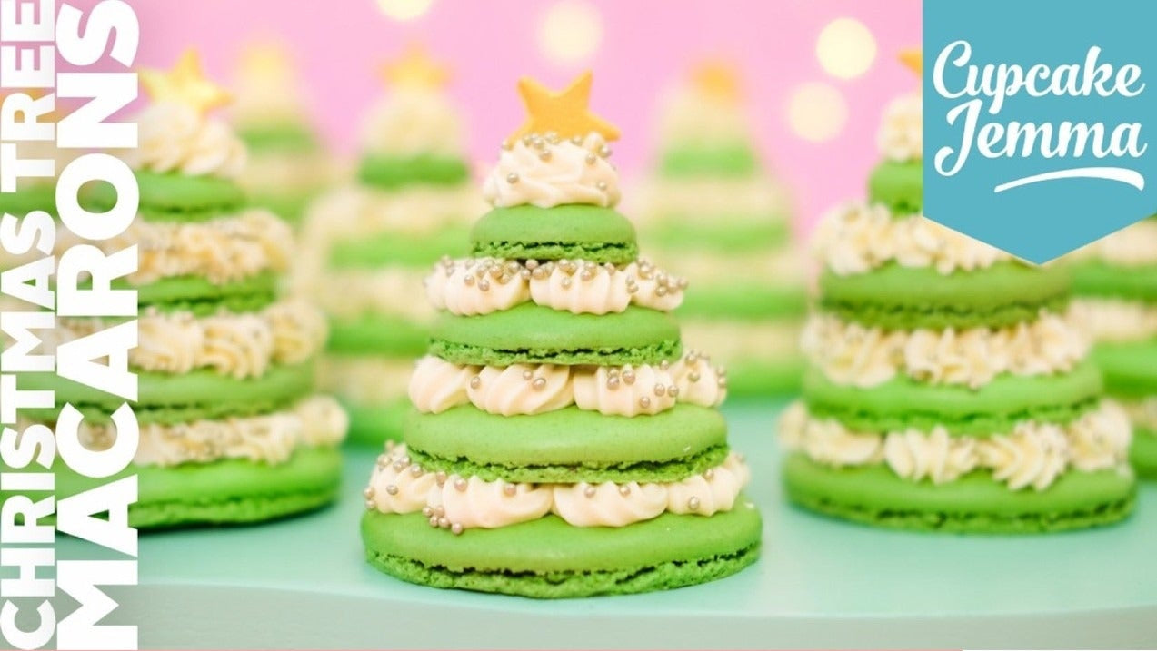 Green Christmas tree macarons stacked with buttercream and topped with a star from Cupcake Jemma recipe guide