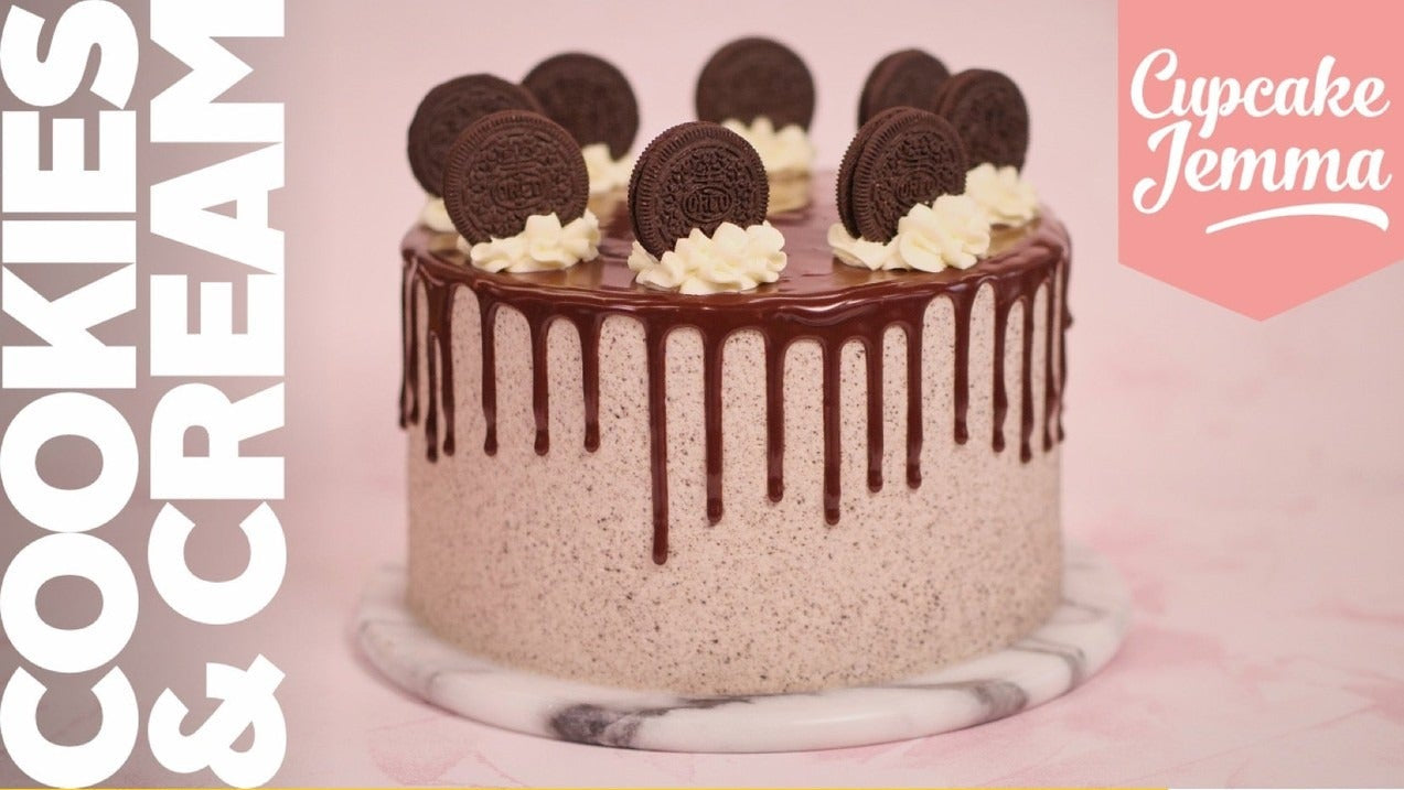 Cookies and Cream Cake with chocolate ganache drip topped with Oreos from Cupcake Jemma recipe for baking lovers