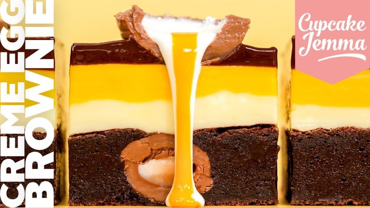 Close-up of rich fudgy Creme Egg Brownies with gooey chocolate and creamy filling from Cupcake Jemma recipe download.
