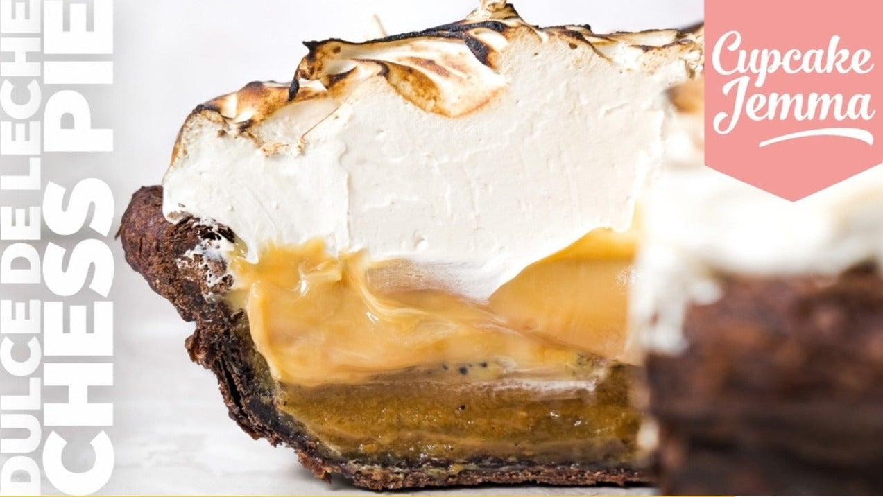 Close-up of a slice of Dulce de Leche Chess Pie with meringue topping and recipe ingredients listed by Cupcake Jemma