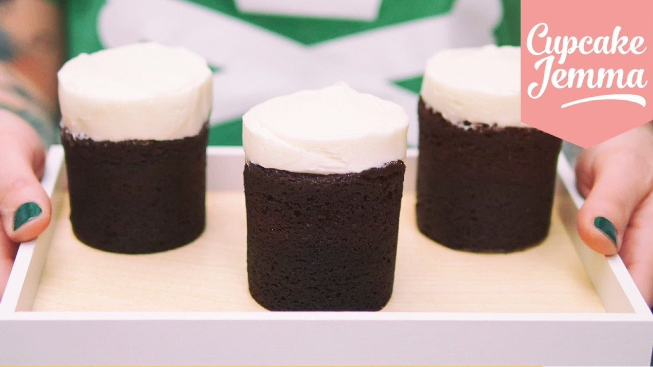 Chocolate Guinness Cupcakes with cream cheese icing recipe by Cupcake Jemma displayed with ingredients list on tray