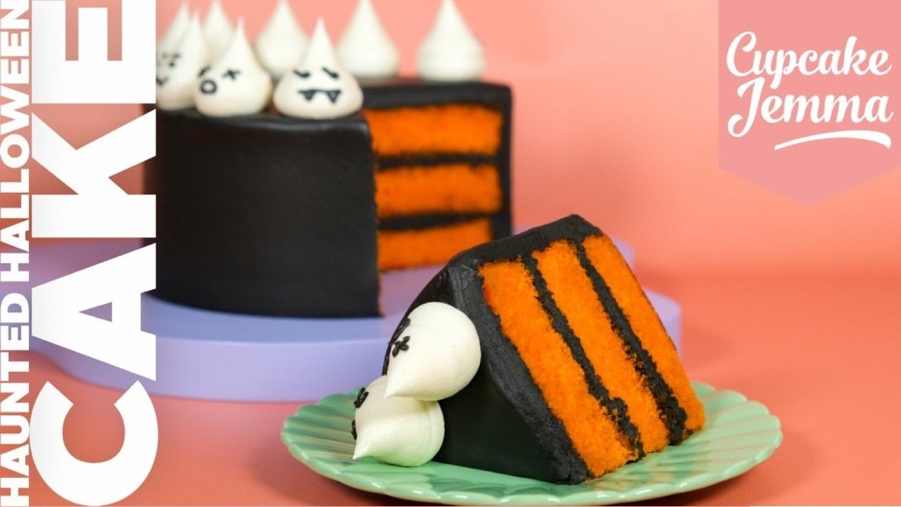 Slice of Halloween Vanilla Cake with black and orange layers on a plate next to the full decorated cake and recipe text