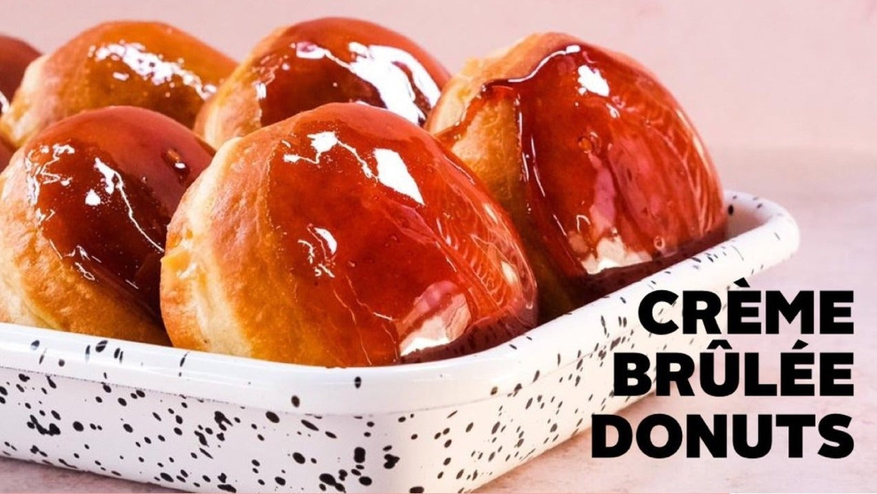 Jemma's Salted Caramel Brulee Donuts with glossy caramelized tops in a speckled white tray for baking recipe download.