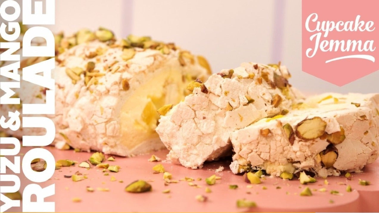 Sliced Mango and Yuzu Roulade with crushed pistachios, showing ingredients list from Cupcake Jemma baking recipe download.
