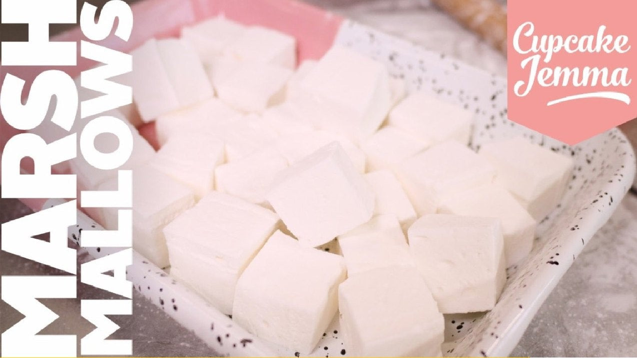 Close-up of homemade marshmallows on a plate with Cupcake Jemma branding and recipe ingredients list.