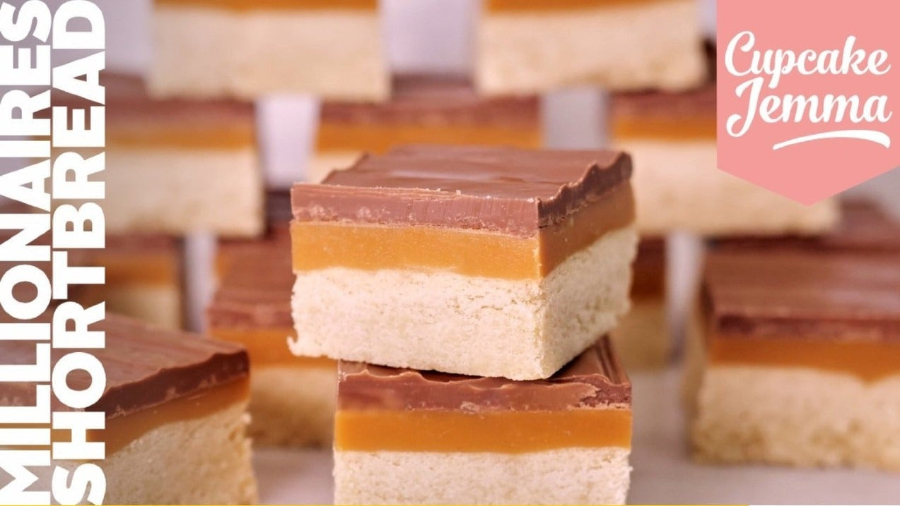 Close-up of layered Millionaires Shortbread with shortbread base, caramel, and milk chocolate topping by Cupcake Jemma recipe