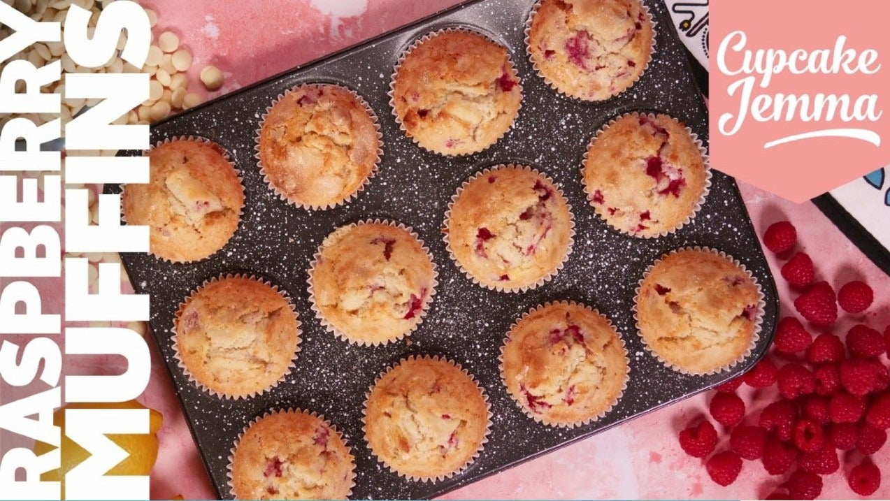 Tray of freshly baked raspberry muffins with recipe ingredients text for Mindful Raspberry Muffins downloadable recipe