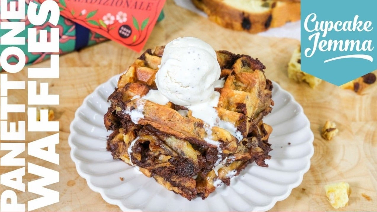 Stack of panettone waffles topped with ice cream served on a white plate from Cupcake Jemma recipe download.