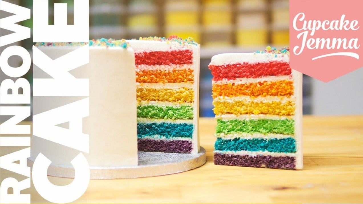 Rainbow Cake downloadable recipe with vibrant layered vanilla cake by Cupcake Jemma showcasing ingredients list for baking.