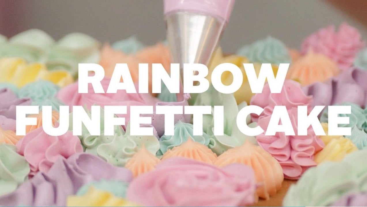 Colorful piped frosting on a Rainbow Funfetti Sheet Cake with recipe ingredients list visible below