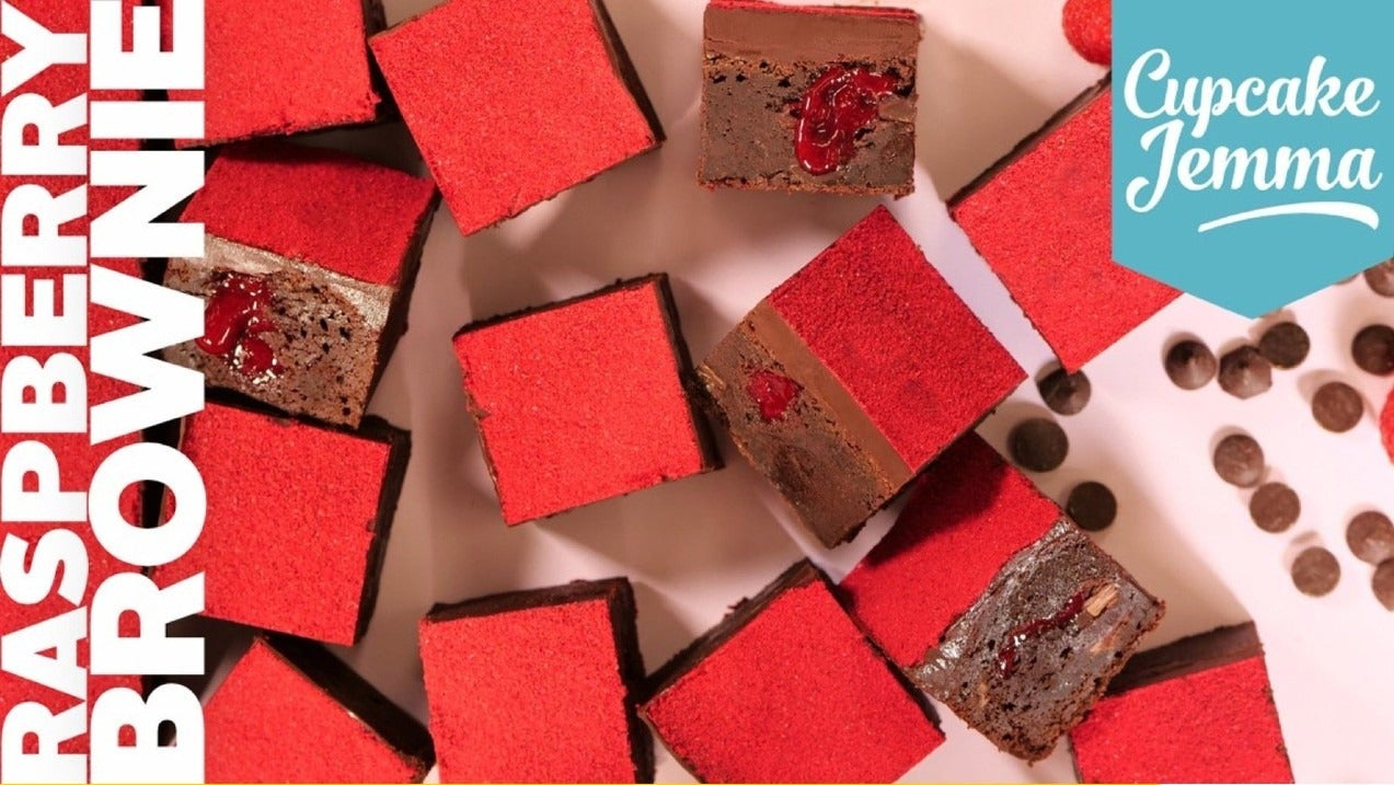 Raspberry Chocolate Brownies with red topping and chocolate chips, recipe ingredients by Cupcake Jemma visible on yellow background