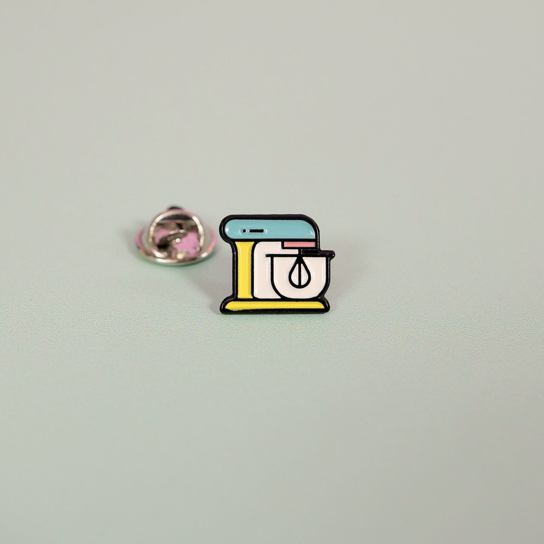 Pin Badge featuring a colorful stand mixer design representing baking by Cupcake Jemma in metal and enamel finish