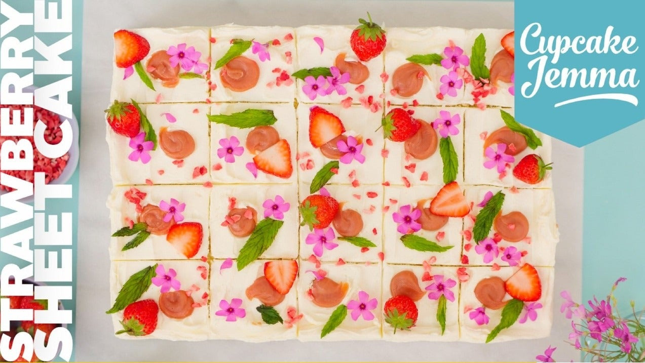 Strawberry and elderflower sheet cake with fresh strawberries mint leaves and edible flowers by Cupcake Jemma recipe