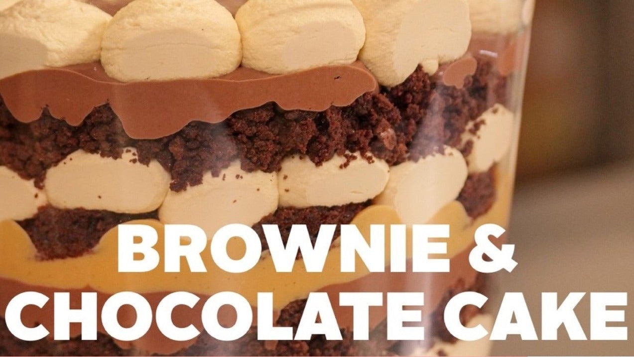 Close-up of layered brownie and chocolate cake trifle with recipe ingredients for Ultimate Salted Caramel Chocolate Trifle downloadable recipe