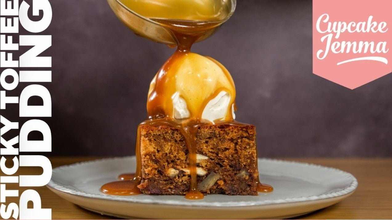 Sticky toffee pudding slice with ice cream and toffee sauce pouring from a spoon, recipe by Cupcake Jemma
