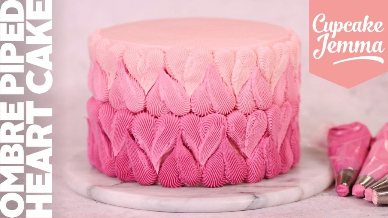 Valentine’s Piped Heart Cake downloadable recipe showing pink ombre heart piped buttercream on cake side