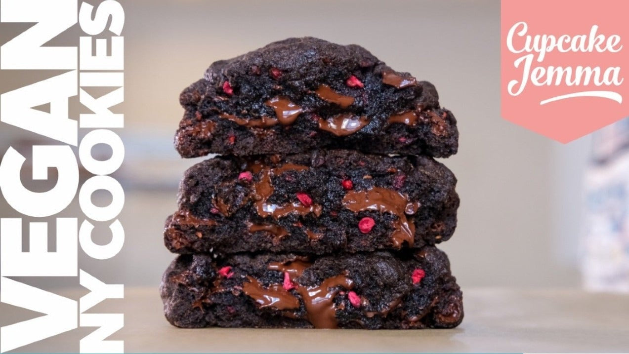 Stack of gooey vegan New York cookies with chocolate chips and raspberries from Cupcake Jemma recipe download