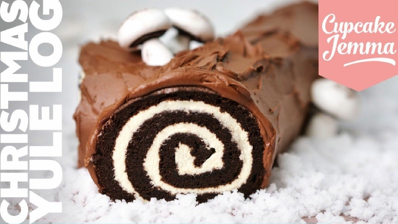 Chocolate yule log with cream filling and chocolate ganache featured in Cupcake Jemma’s Yule Log downloadable recipe.