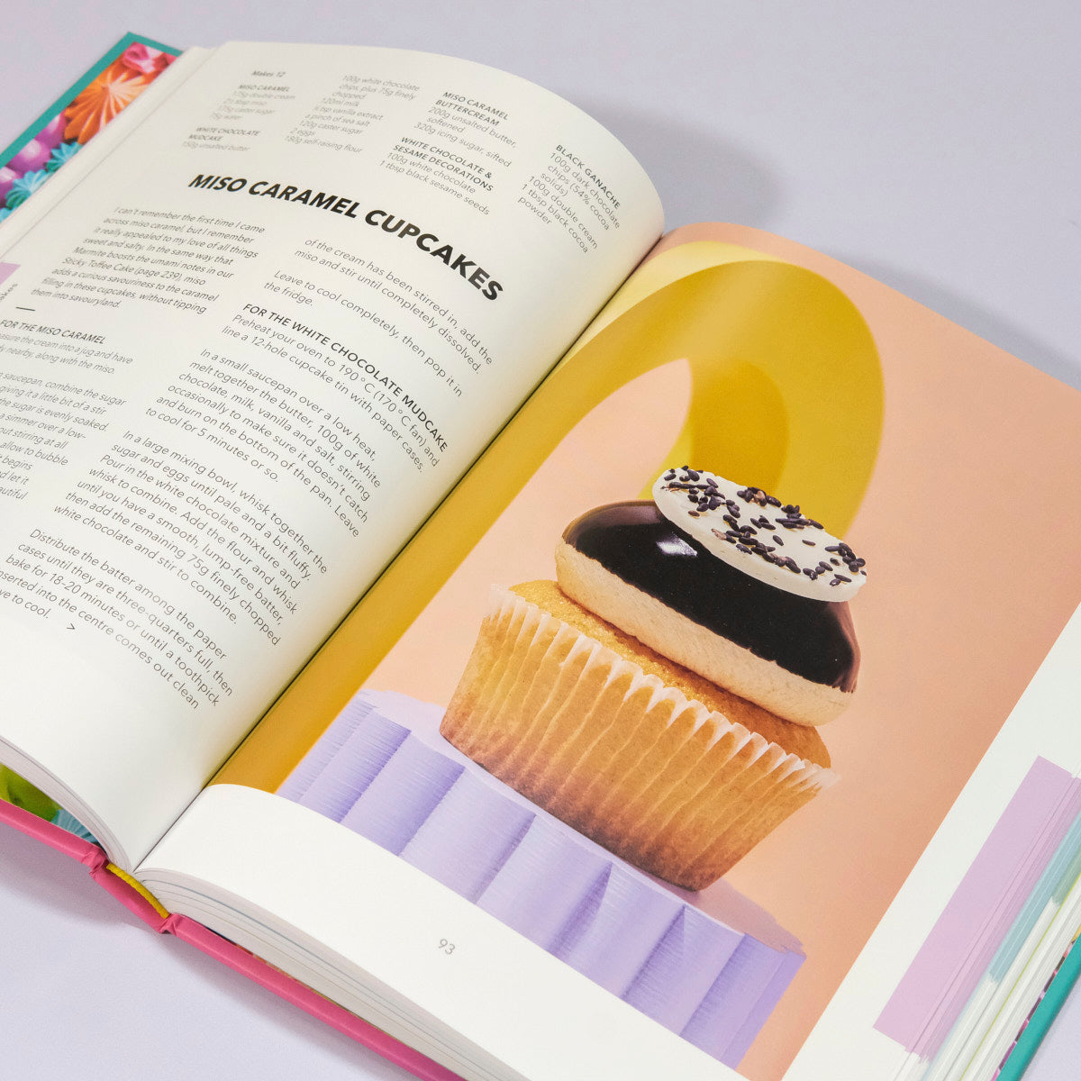 Open page of The Crumbs & Doilies Recipe Book showing miso caramel cupcakes recipe with cupcake photo