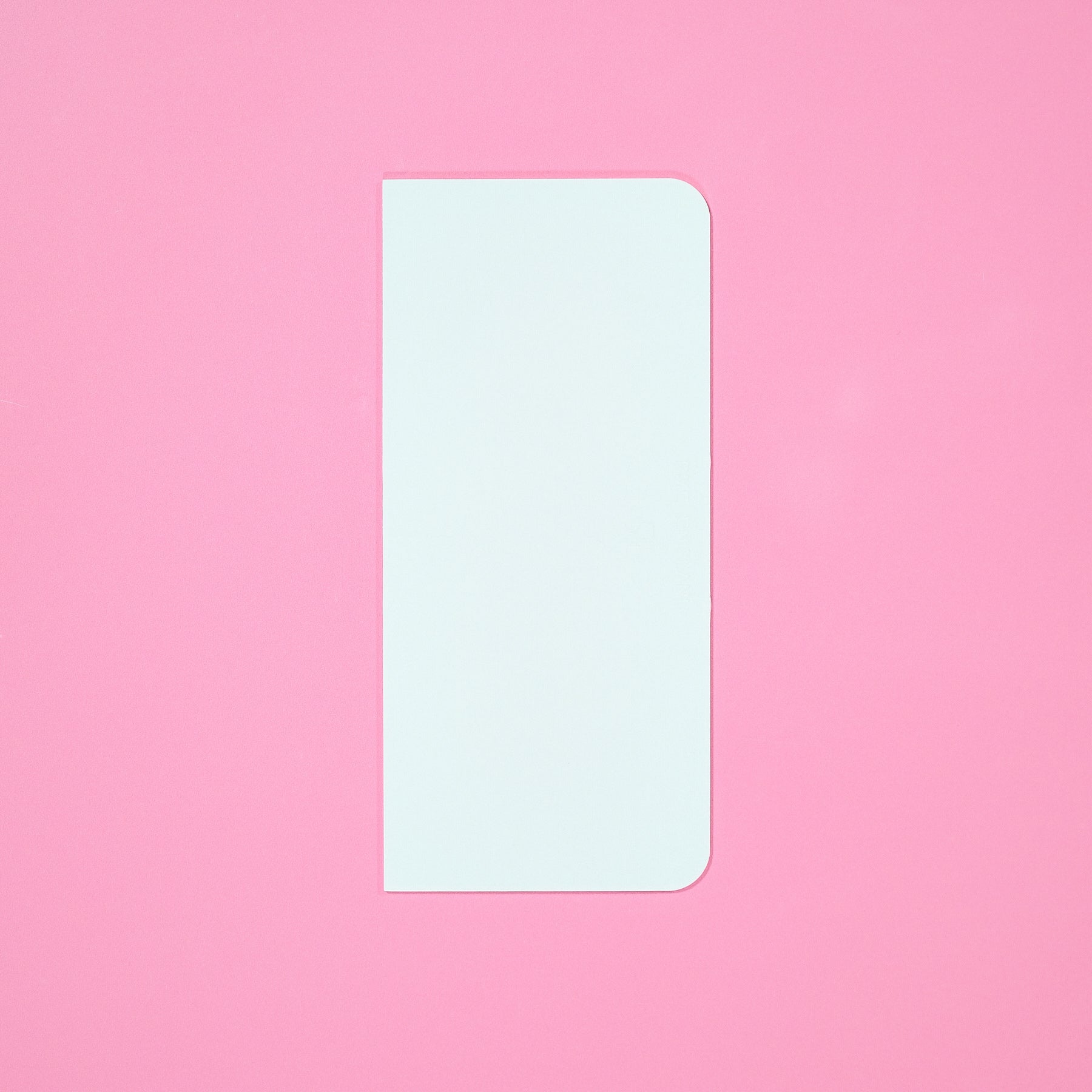 Cake Scraper Tall on pink background, designed for smooth icing and straight sides on taller cakes in baking.