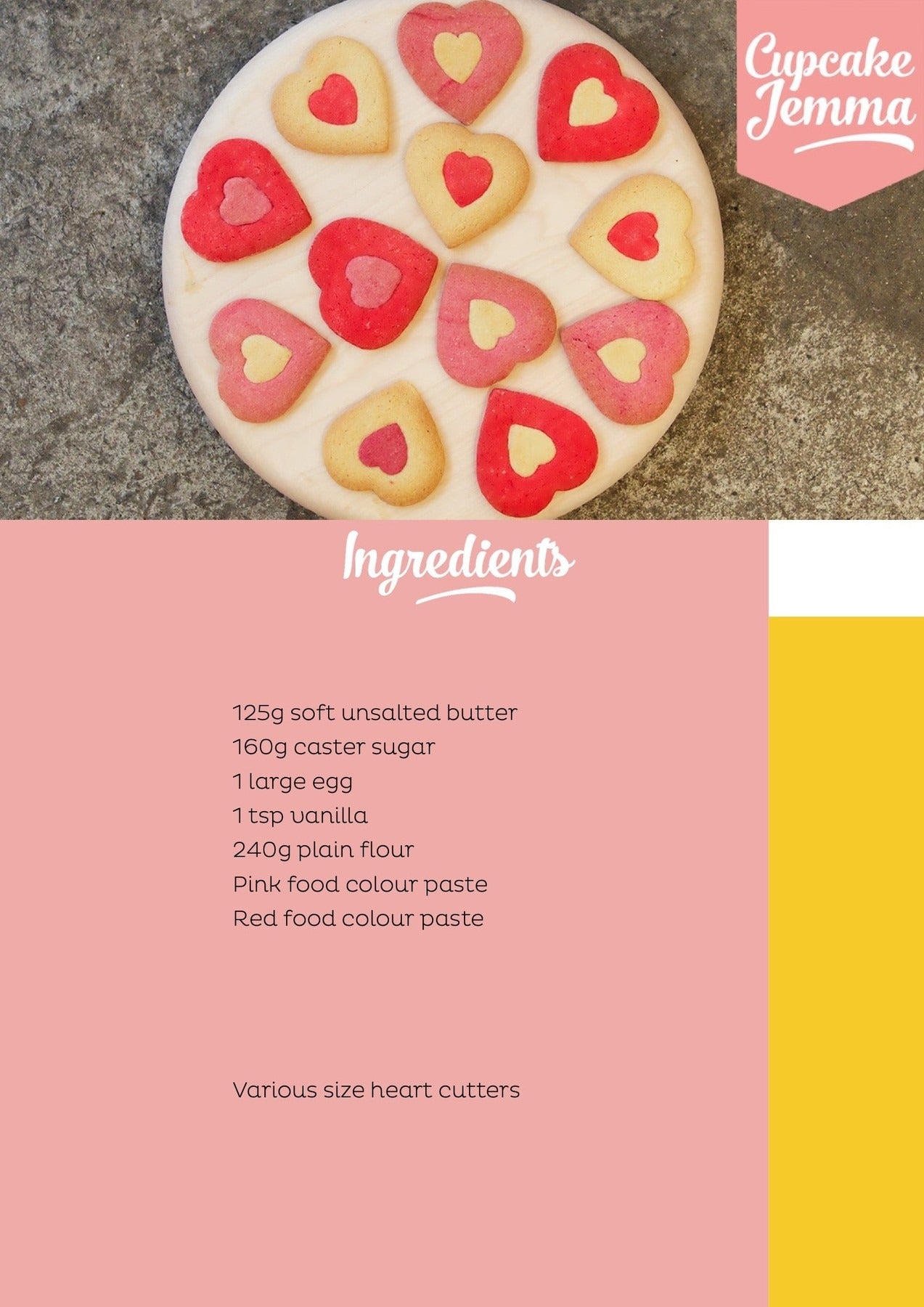 Heart-shaped Valentine's cookies in red and pink on a wooden board with baking ingredients listed below for a downloadable recipe